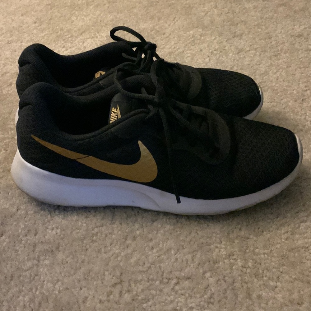 nike sneakers black and gold